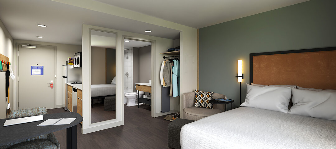 LivSmart Studios wird die neue Hilton-Marke heißen. Jede Einheit wartet, wie hier im Queen Guest Room, mit einer Küche samt Geschirrspüler sowie mit beweglichen Möbeln auf. © 2024 Hilton